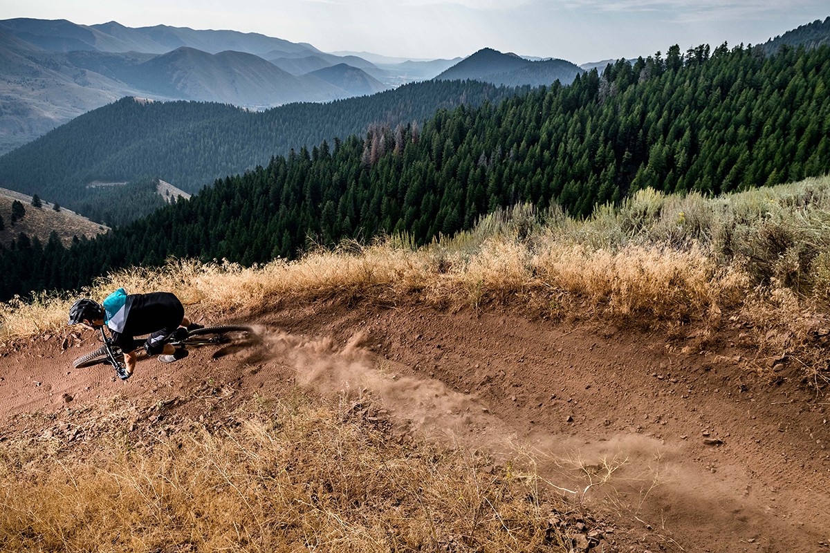 A person descends Bald Mountain on a mountain bike.